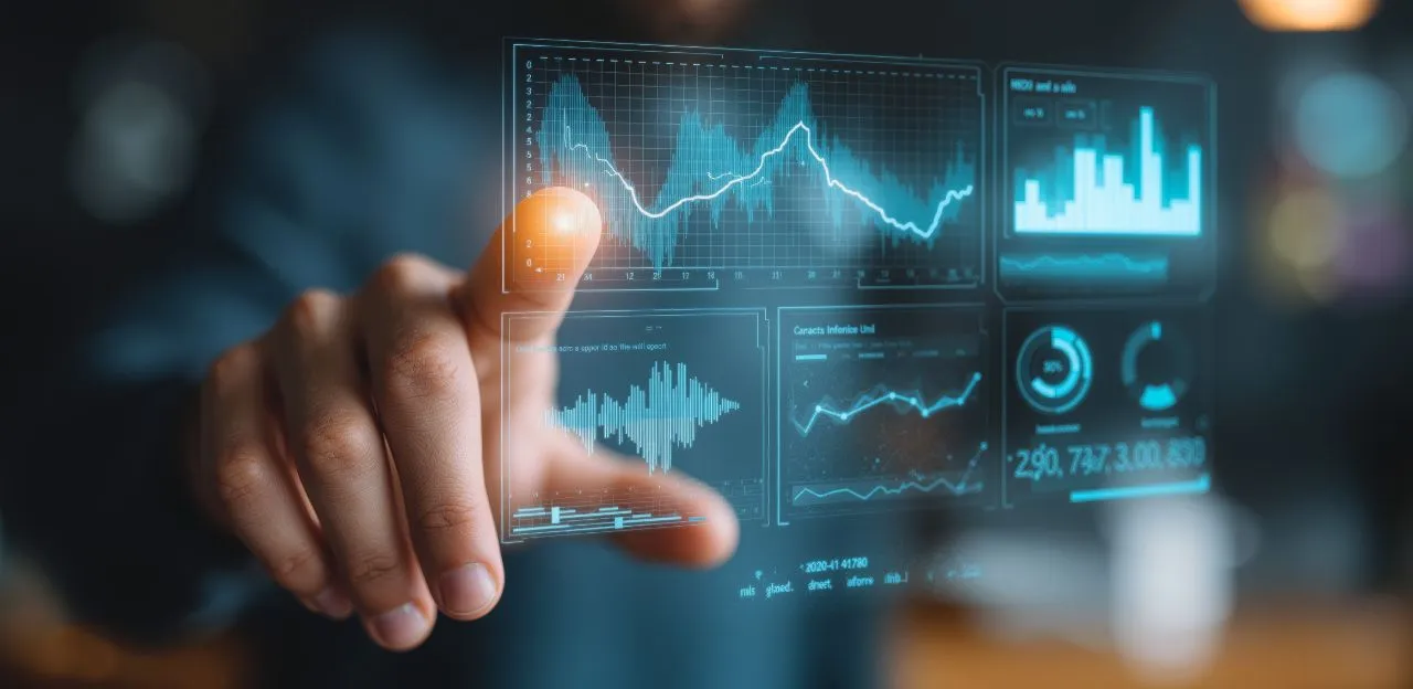 A data analyst working on a laptop, displaying a data visualization dashboard, symbolizing a successful job placement after training in Bangalore.